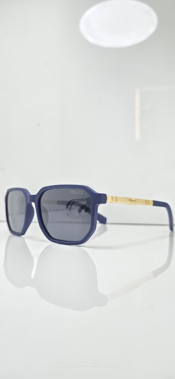 POLICE Sunglasses - Bold Design with Gold Temple Accent & Polarized Lenses.