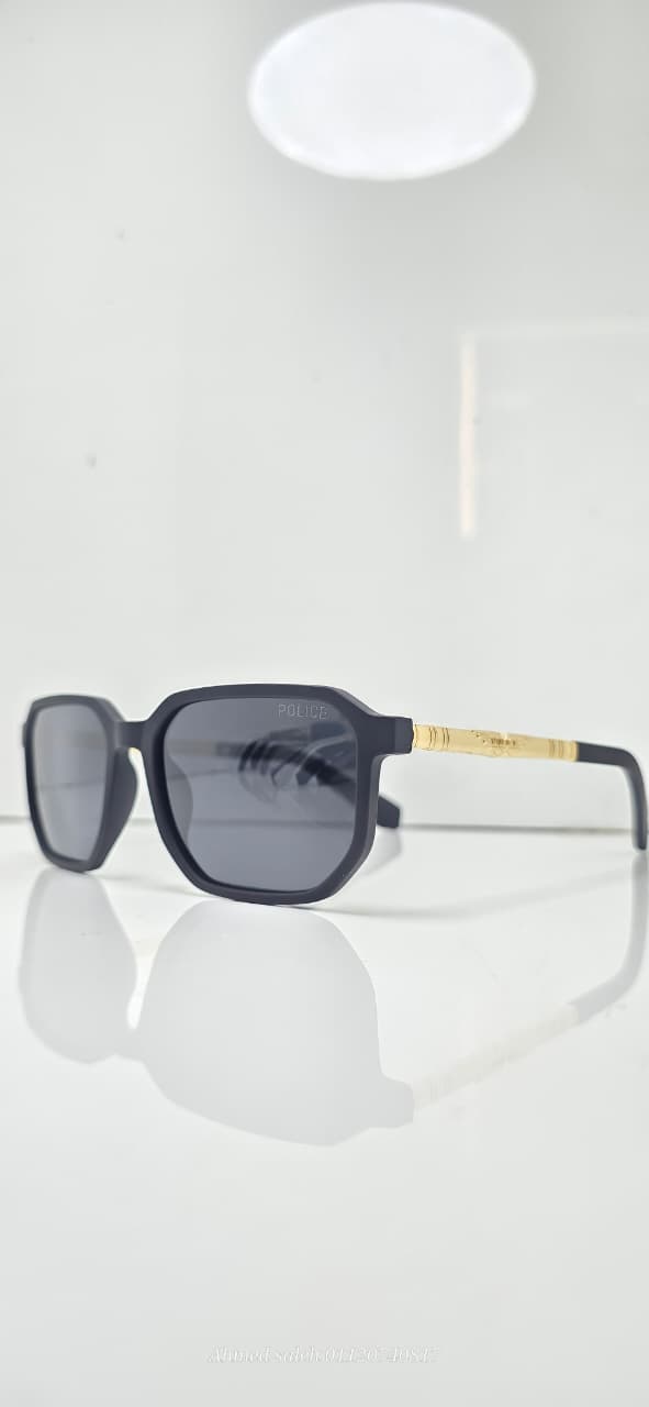 POLICE Sunglasses - Bold Design with Gold Temple Accent & Polarized Lenses.