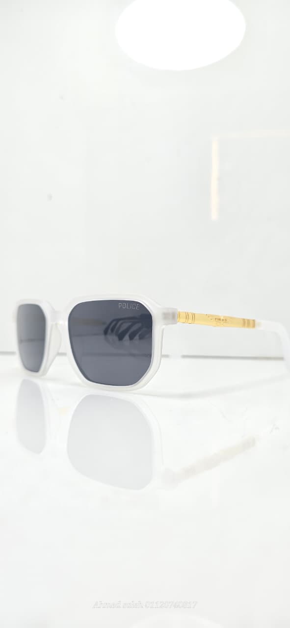 POLICE Sunglasses - Bold Design with Gold Temple Accent & Polarized Lenses.