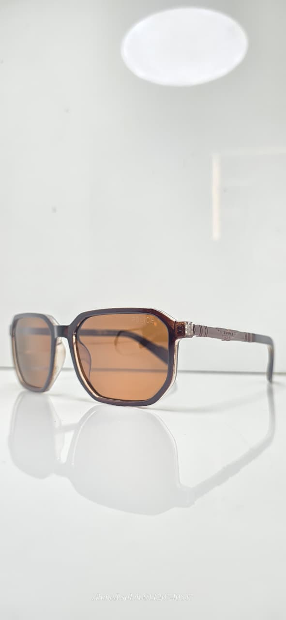 POLICE Sunglasses - Bold Design with Gold Temple Accent & Polarized Lenses.