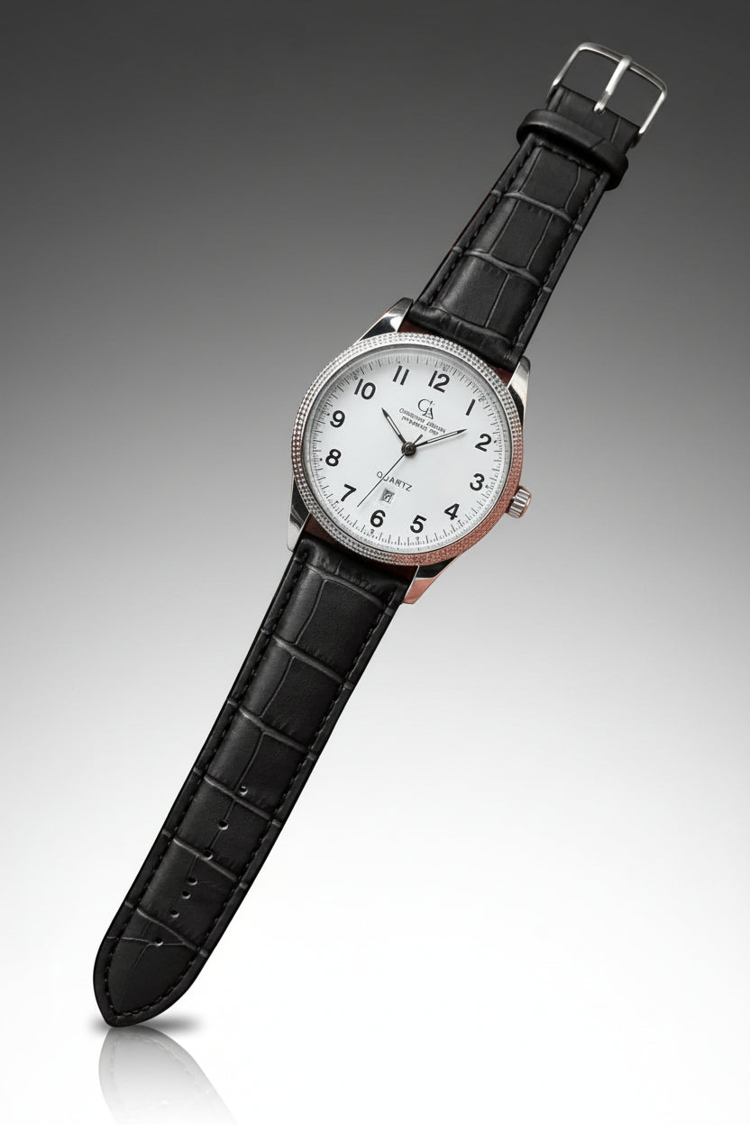 A wristwatch with a black textured leather strap, a silver-tone case, and a white dial with black Arabic numerals. The brand name 'Crown Royal' is visible on the dial.